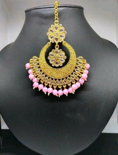 Baby pink and gold tikkah image