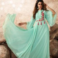 Turquoise Flared and Layered with Floral Pink Embroidered Front Panel Anarkali Standing Pose