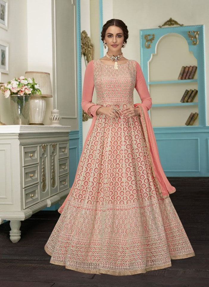 Pink white embroidery intricate pattern Anarkal standingi