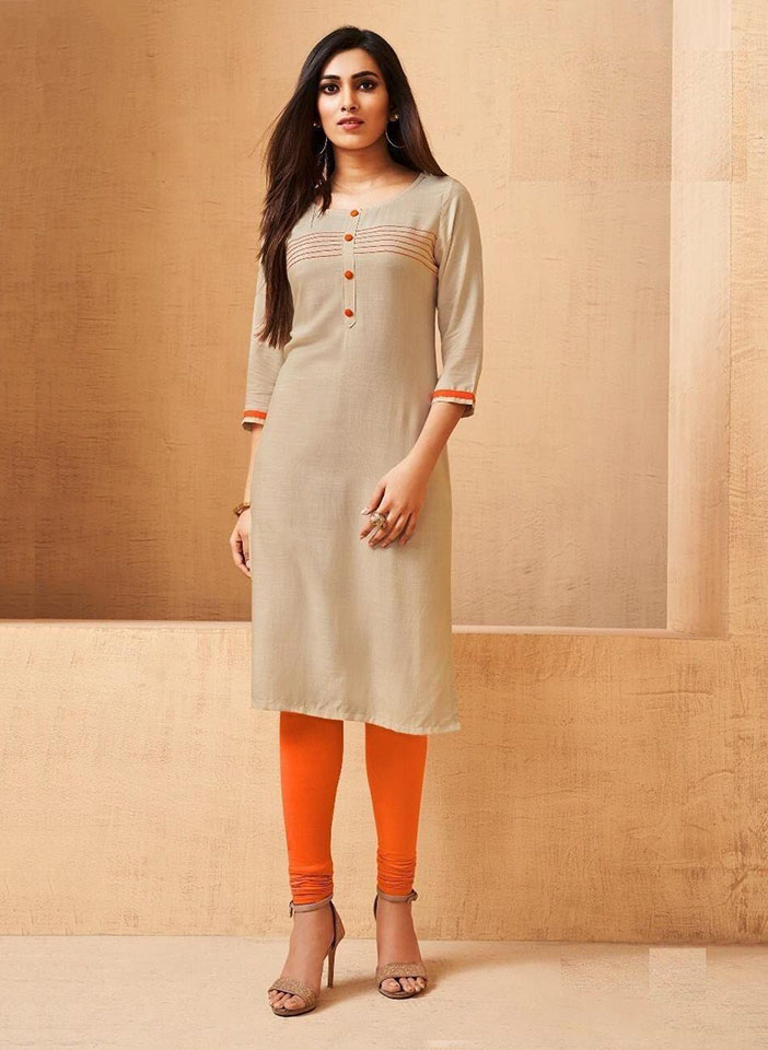 Cream and Orange Rayon Buttoned Churidar Suit